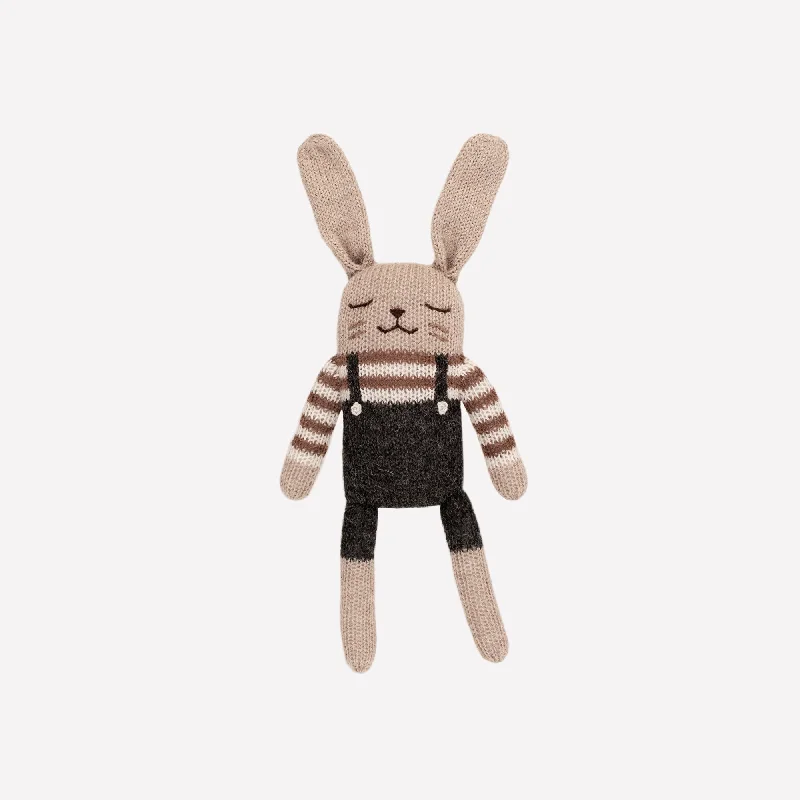 Cuddly and comforting plush charactersMain Sauvage Knit Toy - Bunny - Black Overalls Cuddly and comforting plush charactersMain Sauvage Knit Toy - Bunny - Black Overalls