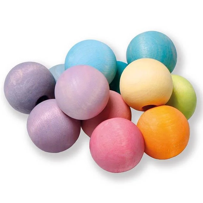 child-safe wooden toys                 Grimm's pastel beads grasper