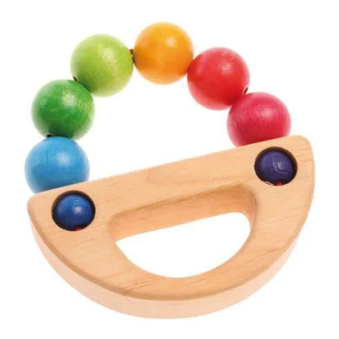 historically inspired wooden toys that teach history                   Grimm's rainbow boat grasper