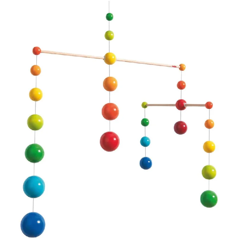 intricately carved wooden toys                   Rainbow Balls - Wooden Mobile