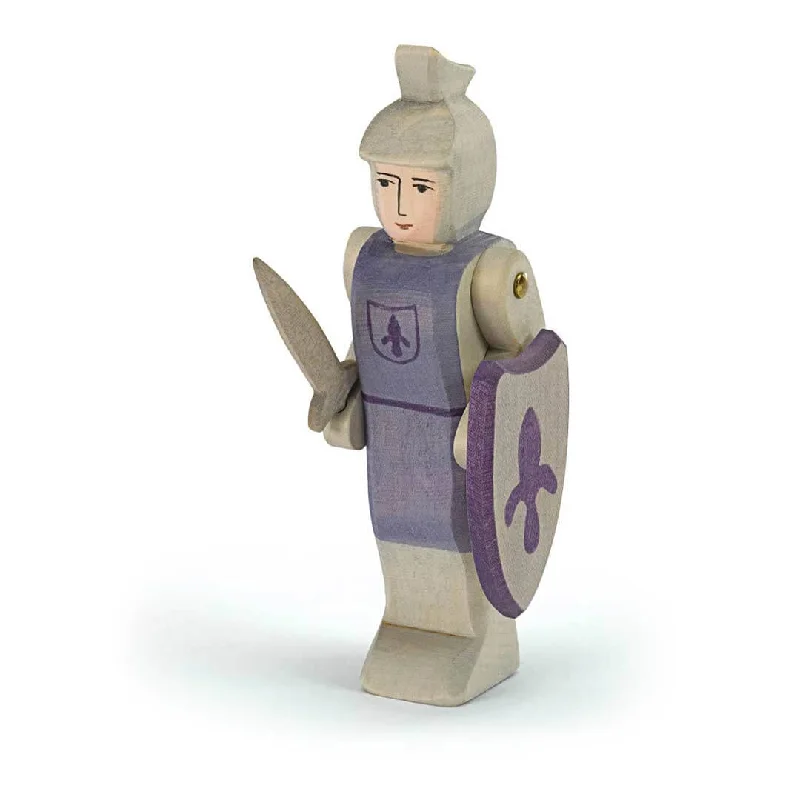 intricately carved wooden toys                   Ostheimer Blue Standing Knight