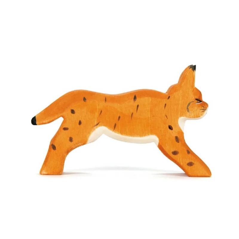 intricately carved wooden toys                   Ostheimer Running Lynx