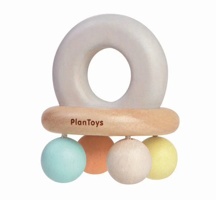 detailed and intricate wooden toys                   Plan Toys Bell Rattle Pastel