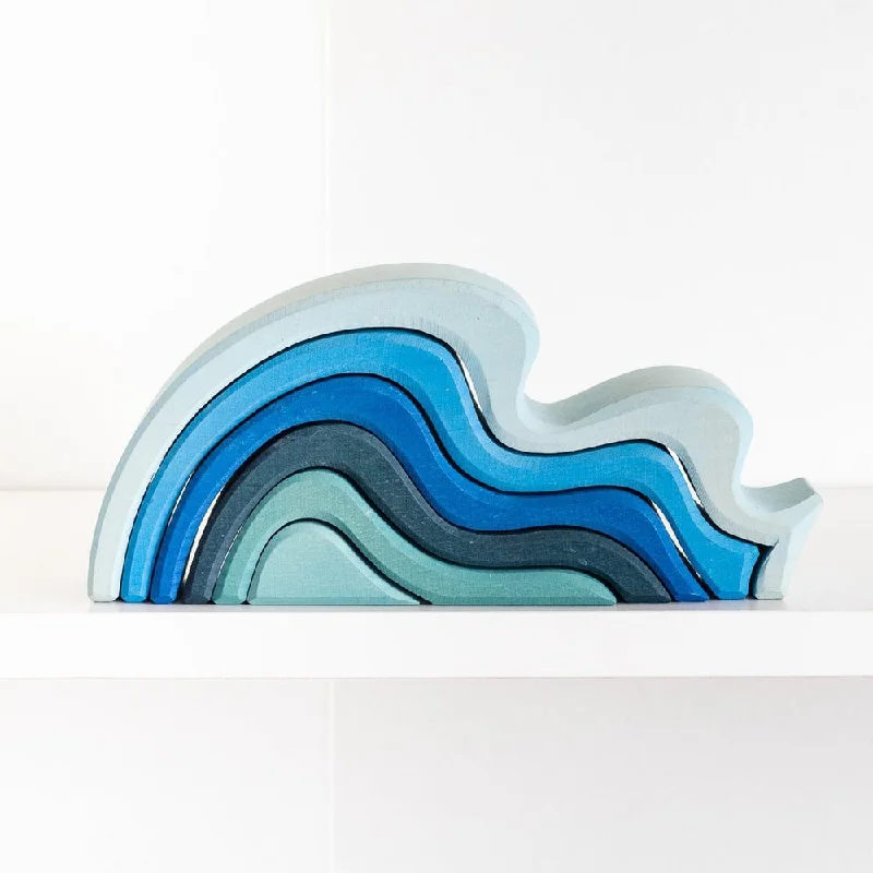 intricately carved wooden toys                   Grimm's wooden wave stacker